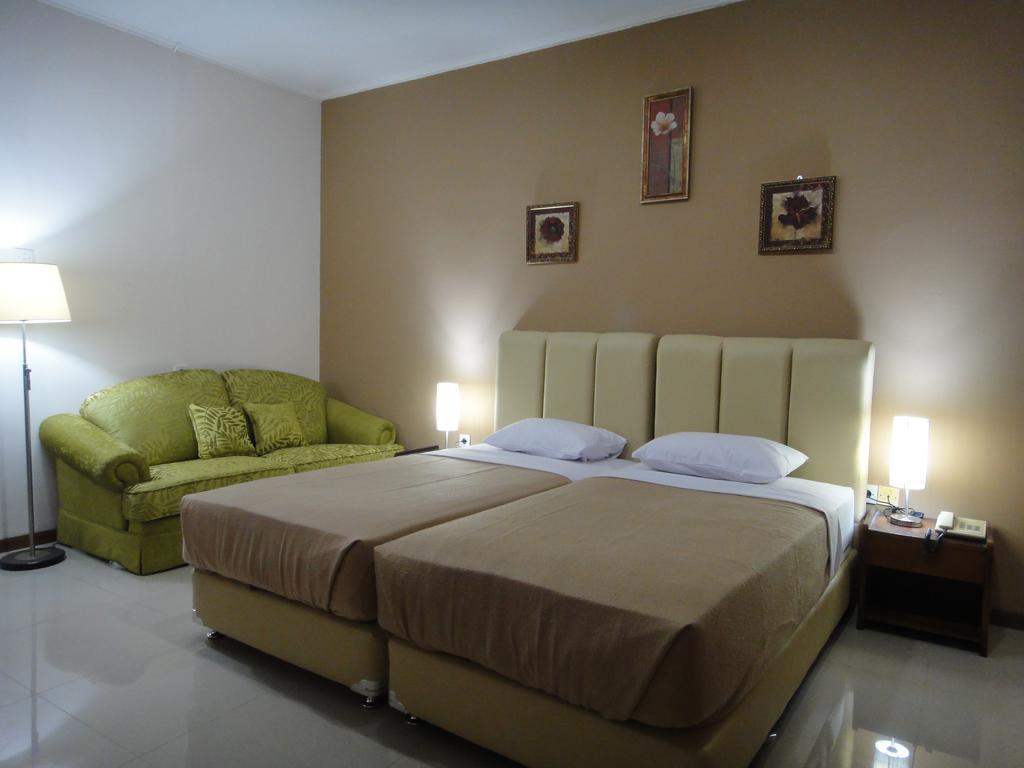 Gondia Guesthouse Джакарта Стая снимка
