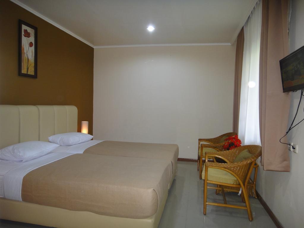 Gondia Guesthouse Джакарта Стая снимка