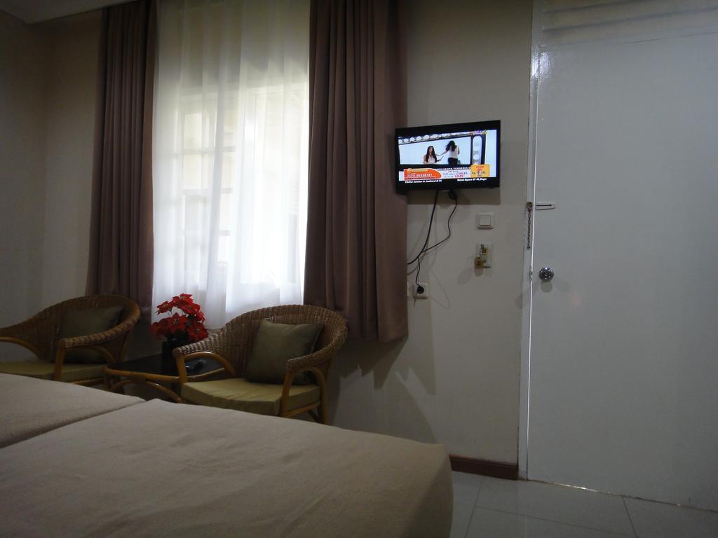 Gondia Guesthouse Джакарта Стая снимка