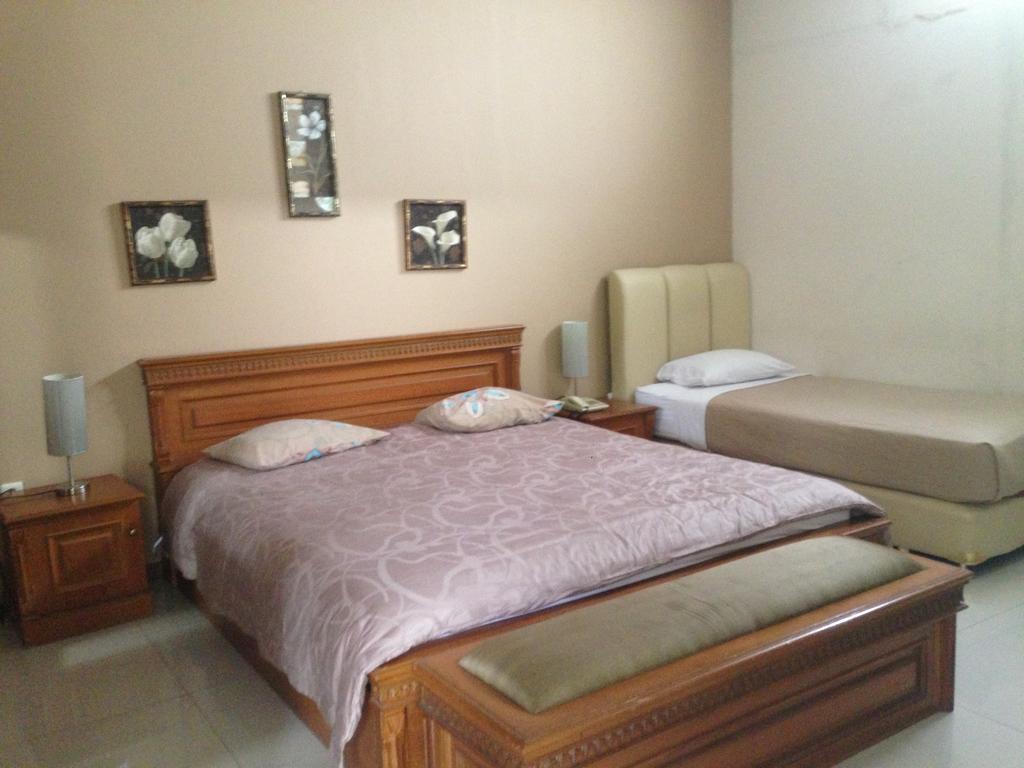 Gondia Guesthouse Джакарта Стая снимка