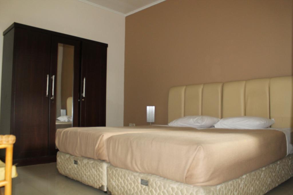 Gondia Guesthouse Джакарта Стая снимка