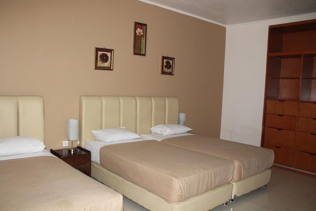Gondia Guesthouse Джакарта Стая снимка