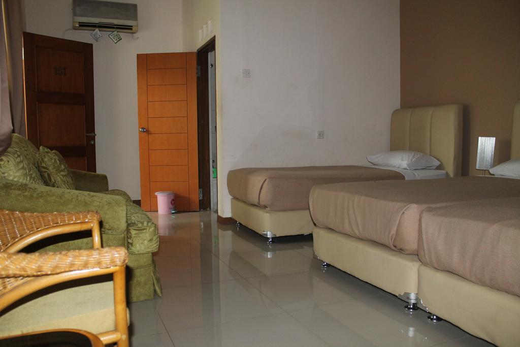 Gondia Guesthouse Джакарта Стая снимка
