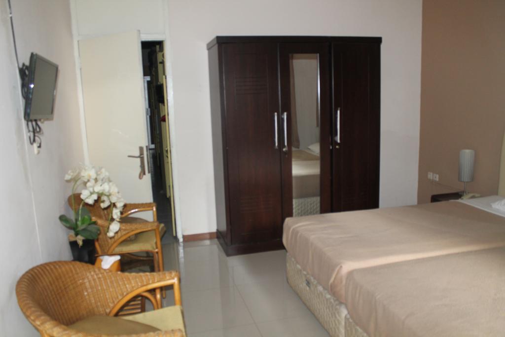 Gondia Guesthouse Джакарта Стая снимка